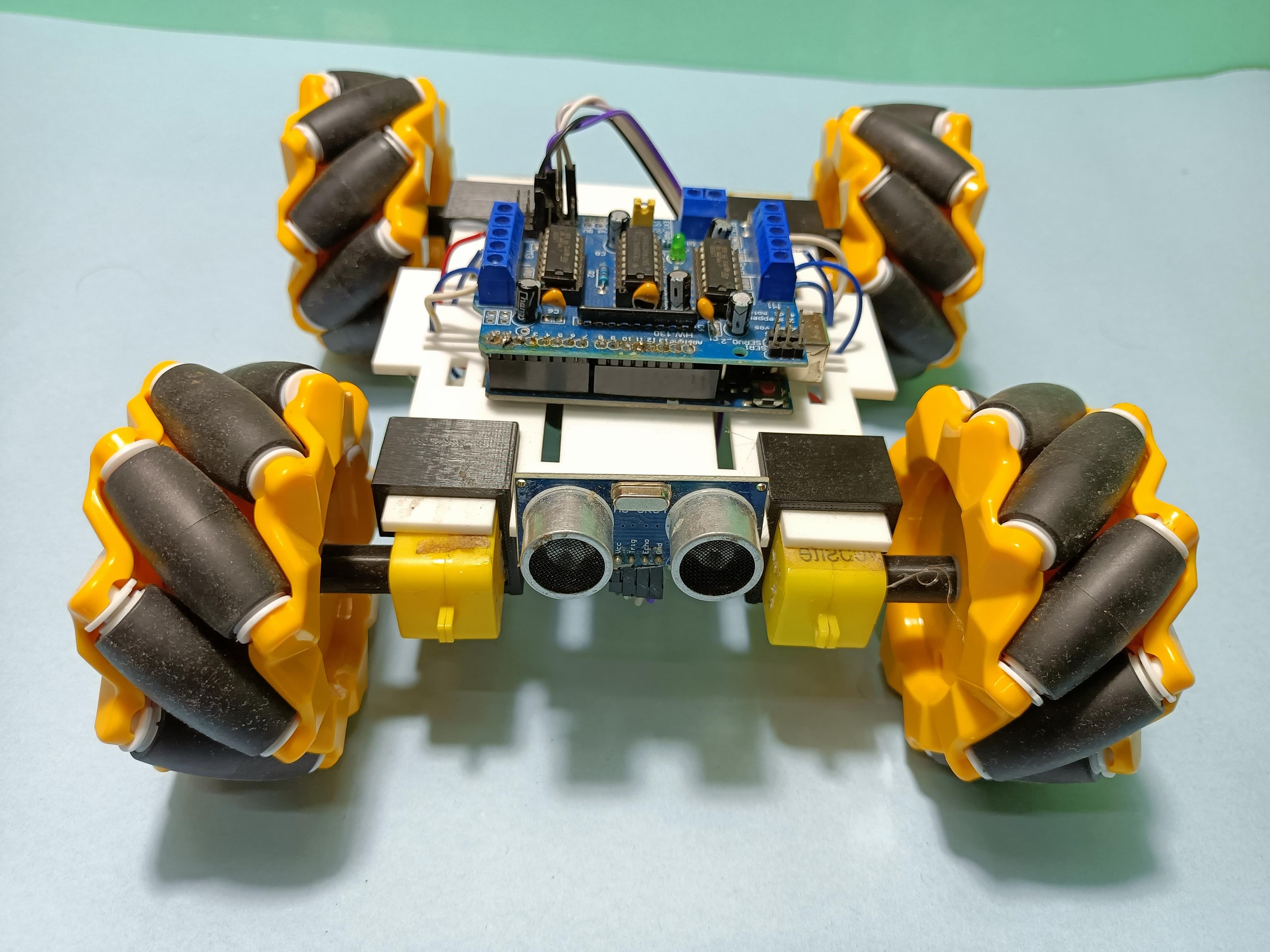 How to Make an Arduino Obstacle Avoiding Car With Mecanum Wheel
